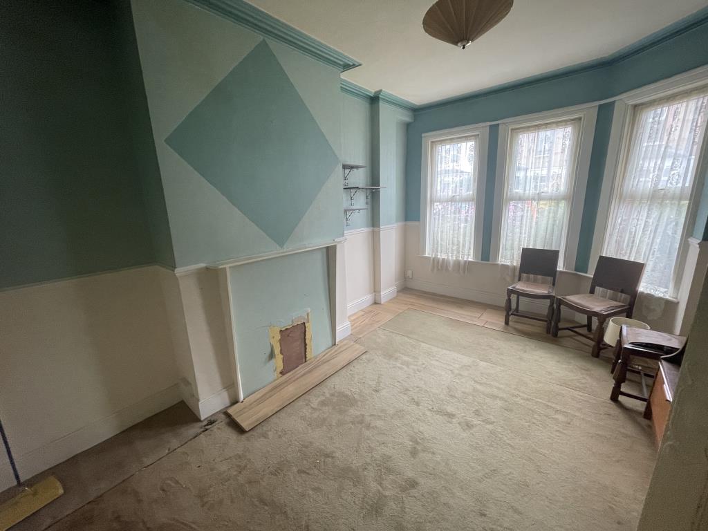 Lot: 5 - TWO-BEDROOM TERRACE HOUSE FOR IMPROVEMENT - living area